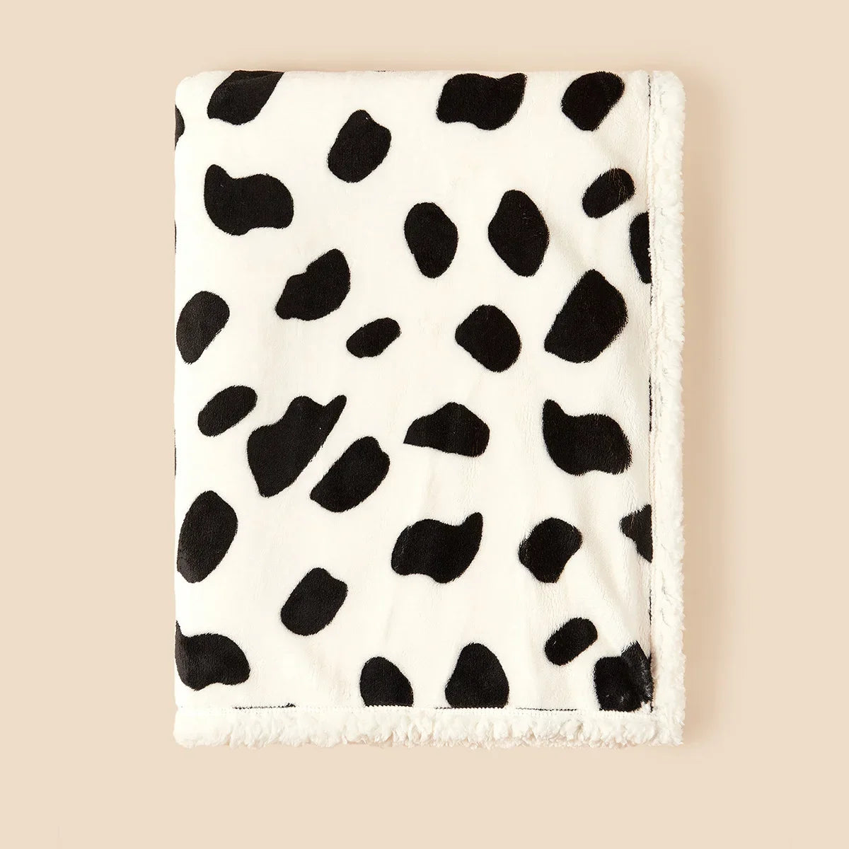 couverture bébé polaire moelleux motif taches vache noir fond blanc