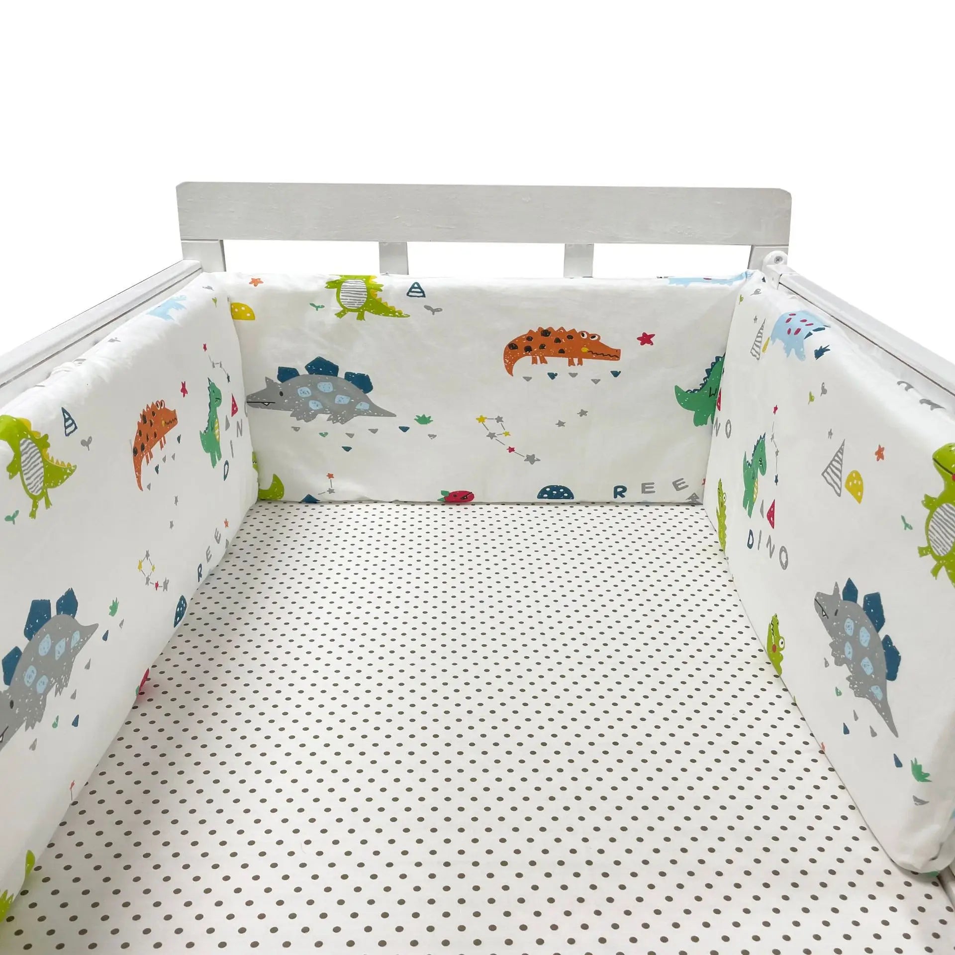 tour de lit tissu rembourré lavable dinosaures gris orange vert jaune fond blanc